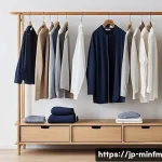 미니멀 워드로브와 패션 블로그 추천 - A modern minimalist wardrobe scene featuring a neatly organized closet with essential items: crisp w...