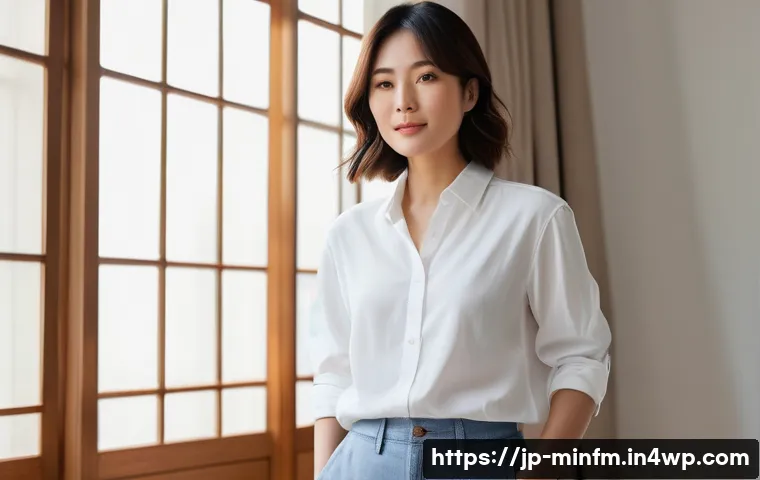 미니멀 워드로브의 비법 공개 - A stylish Japanese woman in her 30s wearing a crisp white shirt with a minimalistic design, paired w...